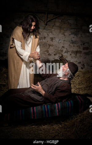 Die Lahmen oder verkrüppelten Mann heilte Jesus Stockfoto