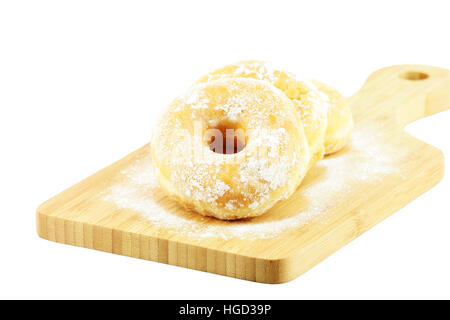Haufen von Donuts, auf einem Holzbrett. Stockfoto