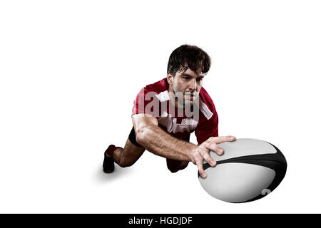 Rugby-Spieler in einer roten Uniform. Weißem Hintergrund Stockfoto