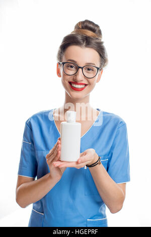 Kosmetikerin mit Flasche Stockfoto