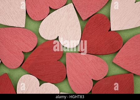 Hintergrund, bestehend aus vielen roten und rosa Herzen Stockfoto