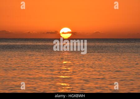 Karibischer Sonnenuntergang Stockfoto