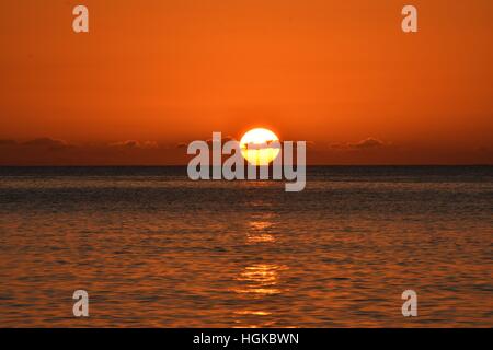 Karibischer Sonnenuntergang Stockfoto