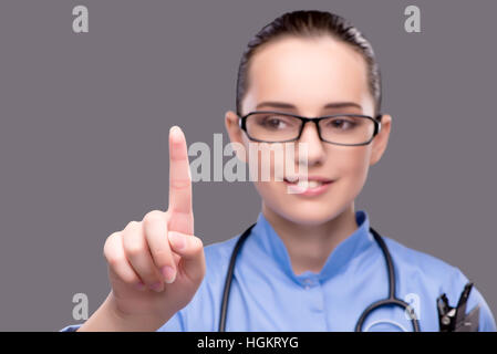 Junger Arzt virtuelle Taste Stockfoto