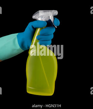 Spritzpistole und Handschuh auf einem schwarzen Stockfoto