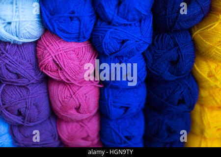 Knitting - balls of wool on a shelf Stockfoto