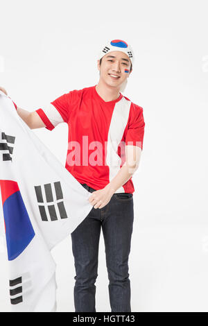 Junge koreanische Cheerleader Mann lächelnd Stockfoto