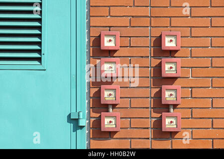 Feueralarm-Schalter an der Wand Stockfoto