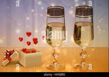 Auf dem Tisch neben dem Fenster zwei schöne Gläser mit Champagner gefüllt. Neben einer schön dekorierten Geschenk mit Herz. Stockfoto