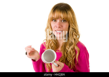 Eine unglückliche Frau mit einer leeren Becher. Stockfoto