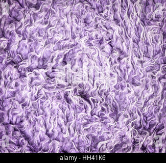 Lila kuschelige Decke Hintergrundtextur Stockfoto