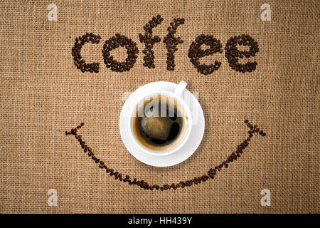 Kaffee mit Sack Textil Lächeln Stockfoto