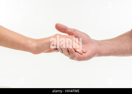 Nahaufnahme der männlichen Hand sorgfältig mit weiblichen hand auf weiß Stockfoto