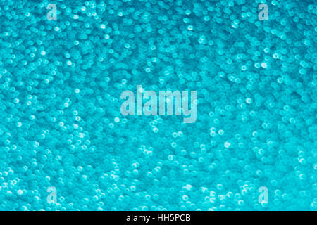 Auszug aus Fokus blaue Punkte, die wie kleine Bläschen - eigentlich die Oberfläche eines Stückes erscheinen strukturierte Kunststoff. Stockfoto