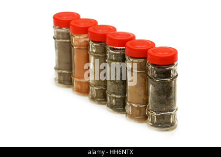 Gewürz-Flaschen auf dem weißen Hintergrund isoliert Stockfoto