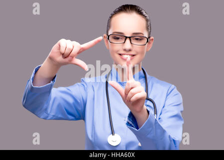 Junger Arzt virtuelle Taste Stockfoto