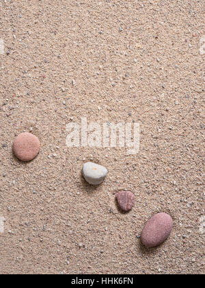 Zen Garten Sand Wellen und Felsen Skulpturen Stockfoto