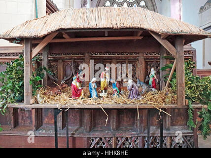 Eine Weihnachtskrippe in der Pfarrkirche St. Mary Jungfrau im Norden Elmham, Norfolk, England, Vereinigtes Königreich. Stockfoto