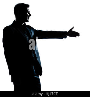 ein kaukasischer Mann Handshake Profil Porträt Silhouette im Studio isoliert weißen Hintergrund Stockfoto