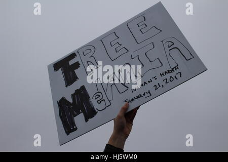 Distrikt von Columbia, USA. 21 Jan, 2017. Ein Mädchen hält ein Schild mit der Aufschrift "freien Melania/Frau März/21. Januar 2017". Stockfoto