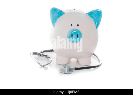 Stethoskop umwickelt blauweißen handbemalten Sparschwein Stockfoto