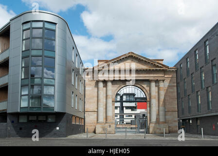 Wohnungen auf dem Gelände des ehemaligen Glasgow Fleischmarkt und Schlachthof, die Teil der ursprünglichen Fassade integrieren. Stockfoto