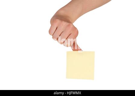 eine Hand hält ein Ticket auf seinen Daumen, isoliert Stockfoto