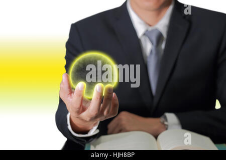 Business Mann Hand halten gelben Mondes, wie alles in der Hand Konzept. Stockfoto