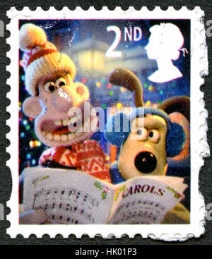 Großbritannien - ca. 2010: Eine gebrauchte Briefmarke aus dem Vereinigten Königreich, Darstellung zur Veranschaulichung der Wallace und Gromit singen Weihnachtslieder, ca. 2010. Stockfoto