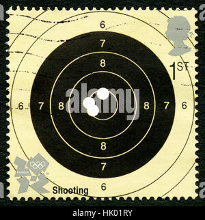 Großbritannien - ca. 2012: Eine gebrauchte Briefmarke aus dem Vereinigten Königreich, Shooting-Ereignis auf die 2012 Olympischen Spiele in London ca. 2012 zu feiern. Stockfoto