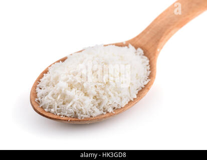 Holzlöffel der Kokosnuss Späne isoliert auf weiss Stockfoto