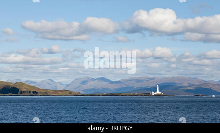 Segeln auf dem Firth Of Lorne Lismore Leuchtturm, Schottland, Vereinigtes Königreich Stockfoto