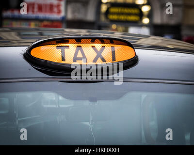 London Taxi Taxi Leuchtreklame, London UK Stockfoto