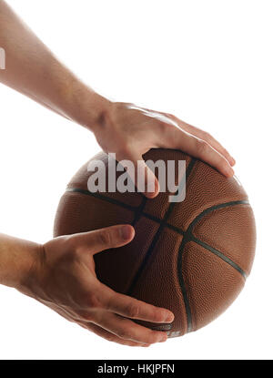 halten Sie Basketball Ball isoliert auf weißem Hintergrund Stockfoto