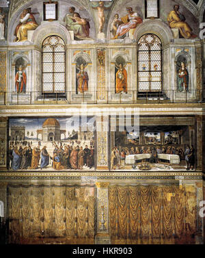 Die Decke der Sixtinischen Kapelle, gemalt von Michelangelo, enthält die berühmten Szenen der Genesis, wie die Schöpfung Adams. Diese ikonische Fresko-Serie ist eines der berühmtesten Kunstwerke der westlichen Kunstgeschichte, die im Vatikan gefunden wurden. Stockfoto