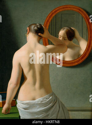 Dieses Gemälde von C. W. Eckersberg aus dem Jahr 1841 mit dem Titel *Kvinde foran et spejl* (Frau vor einem Spiegel) zeigt eine junge Frau, die sich in einem Spiegel beobachtet. Das Werk spiegelt Eckersbergs Meisterschaft in der Erfassung menschlicher Emotionen und des zarten Lichts der dänischen Goldzeitmalerei wider. Stockfoto