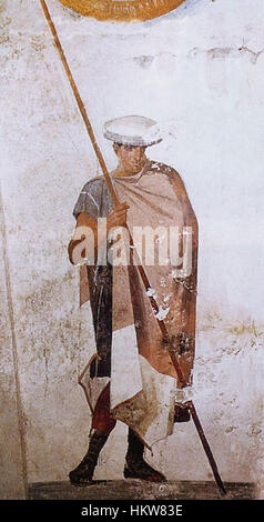Ein Fresko mit einem mazedonischen Soldaten aus dem 4. Jahrhundert v. Chr., entdeckt im Grab von Agios Athanasios. Dieses Kunstwerk bietet einen Einblick in alte mazedonische Militärkleidung und Begräbnispraktiken. Stockfoto