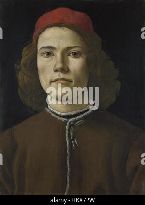 Sandro Botticellis „Porträt eines jungen Mannes“ ist ein berühmtes Werk aus der italienischen Renaissance. Das Gemälde zeichnet sich durch Botticellis charakteristische Verwendung von zarten Linien und ätherischer Schönheit aus, die einen jungen Mann mit kontemplativem Ausdruck darstellen, symbolisch für Renaissanceporträts. Stockfoto