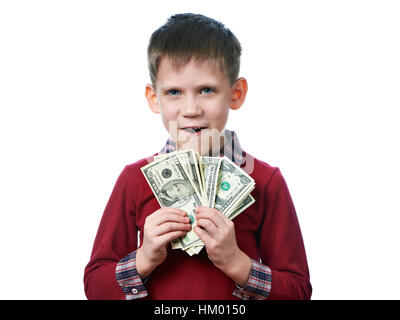 Schöne kleine Junge mit Dollarnoten in seine Hände isoliert weiss Stockfoto