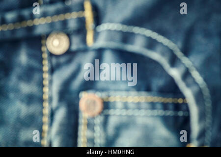 Schließen unscharf Bild von Blue Jeans Stoff Stiche, abstrakten Hintergrund. Stockfoto
