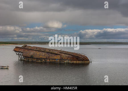 Kriegsschiff Wrack in der Nähe von Weddell Bay in Orkney, Schottland. Stockfoto