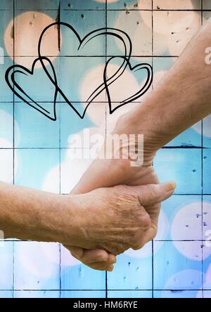 Nahaufnahme von älteres paar Hand in Hand Stockfoto