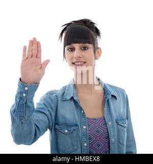 junges Mädchen mit erhobener Hand im Signal zu stoppen, isoliert auf weißem Hintergrund Stockfoto