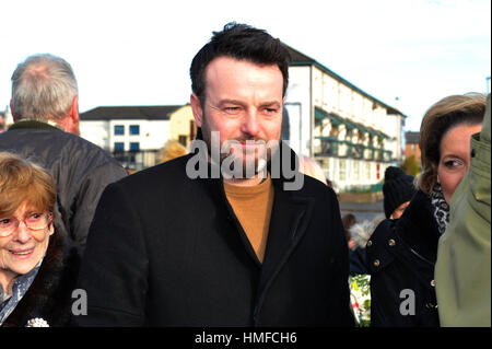 SDLP Führer Colum Eastwood Teilnahme an der 45. Trauerfeier der Bloody Sunday in Derry, Londonderry. Stockfoto