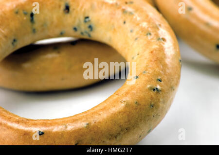 Ring-Bagels Closeup Makro, sanftes Bokeh Schatten Stockfoto