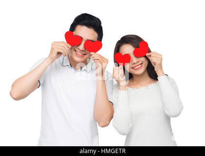 Freund und Freundin küssen mit glücklichen Gesichtsausdruck schauen einander in die Augen. Asiatische Liebespaar am Anfang der Liebesgeschichte mit f Stockfoto