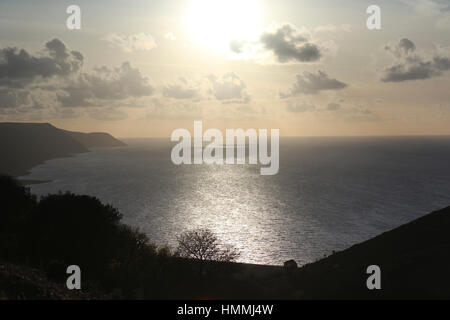 Sonnenuntergang über Bossington Strand Stockfoto