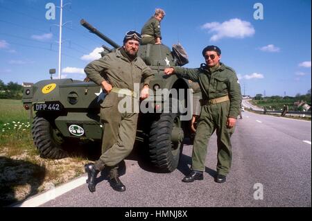 Normandie (Frankreich), Kriegsveteranen und Sammler von Vintage Militärfahrzeuge teilnehmen die jährliche Zeremonien für das Gedenken der Landung der Alliierten vom Juni 1944, M8 Greyhound leicht gepanzerten Auto Stockfoto