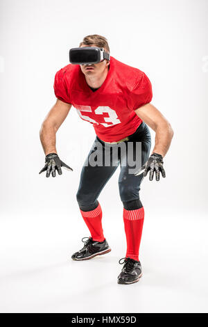 Virtual-Reality-Kopfhörer-Football-Spieler Stockfoto