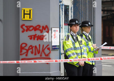 Metropolitanpolizei diensthabenden während einer Anti-Kürzungen Protest im Zentrum von London, England, Vereinigtes Königreich Stockfoto